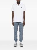 Compass-badge trousers
